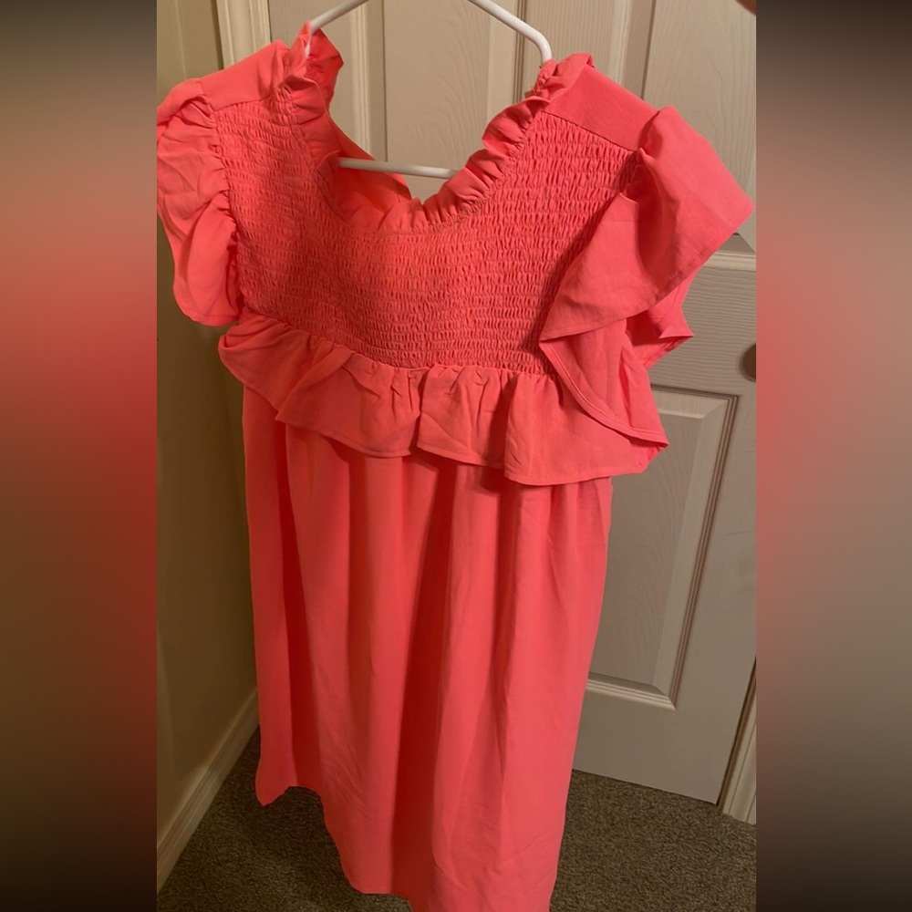 Brand new bright pink dress never worn. New with tags.